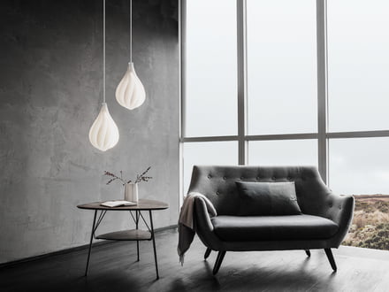 Lampshades by Vita at different heights.