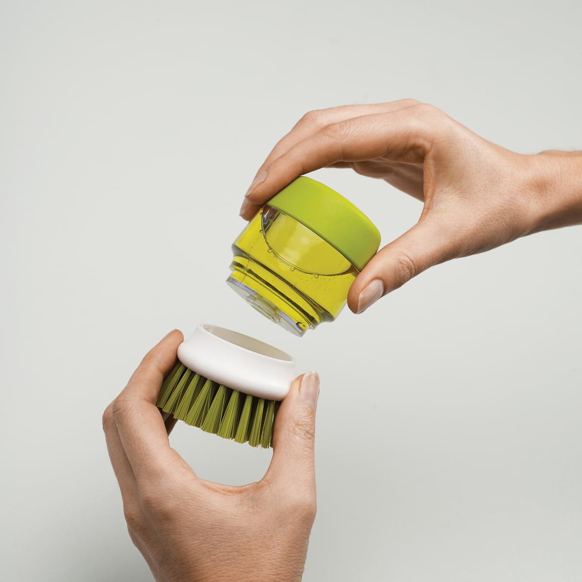 Twist N' Scrub Soap Dispensing Palm Brush – Tovolo