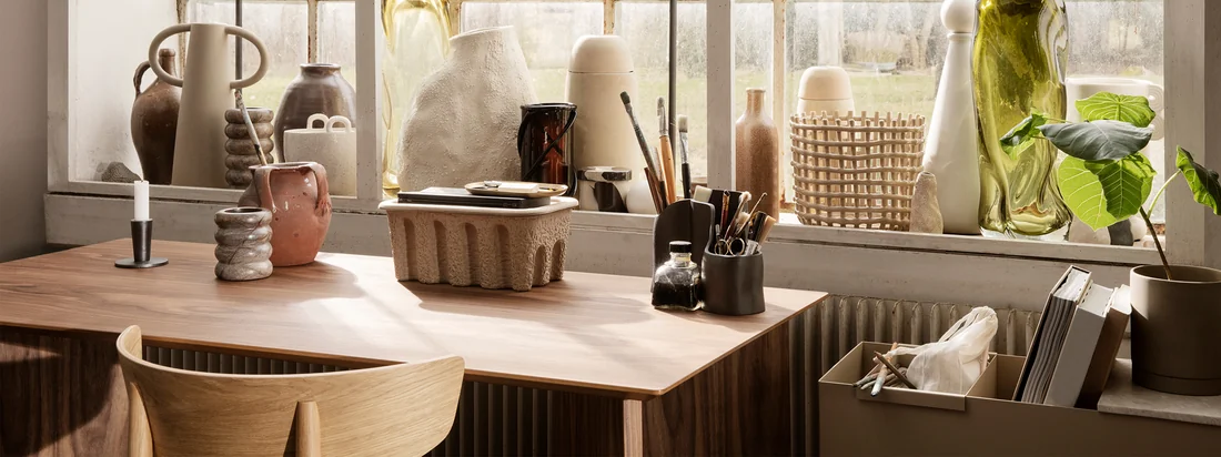 Ferm Living aims to bring a new zest to the workday with their Office Collection. From smoked oak shelves in subtle colors to polished brass pen holders and trays in perforated powder-coated metal.