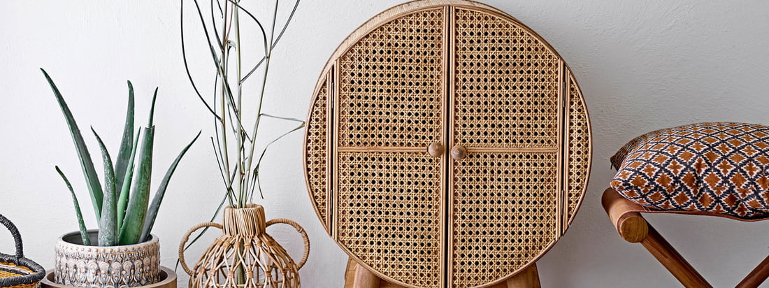 Compactly designed, Otto cabinet consists of a four-legged frame made of spruce wood and a round cabinet element with walls and doors made of rattan. The round shape stands out and becomes an eye-catcher in any room.