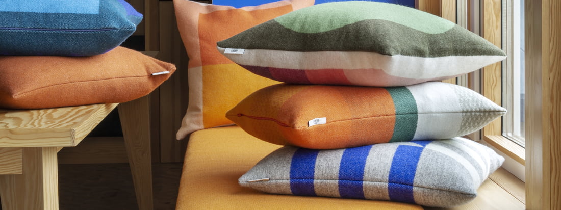Blankets and pillows make any home really cozy. Playing with different textiles will bring a homey atmosphere to any room, no matter how minimalist.