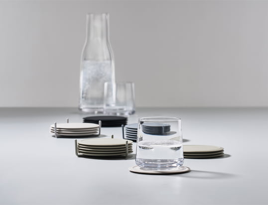 The glass coasters by Zone Denmark in the ambience view: The glass coasters not only protect the table from unsightly scratches and stains, but also set colourful accents.