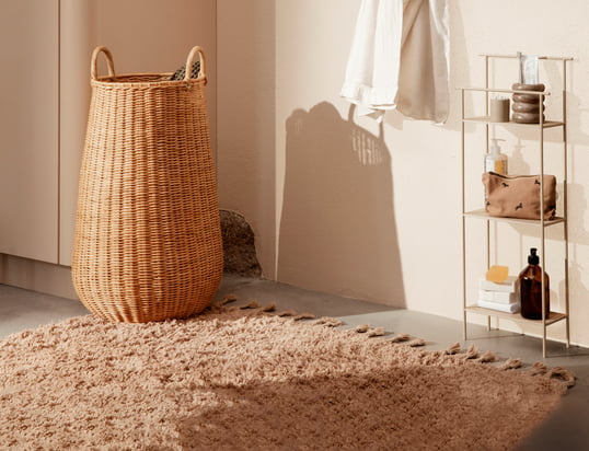 The woven rattan laundry basket by ferm Living : The laundry basket looks particularly calm and natural and finds a suitable place in every room.