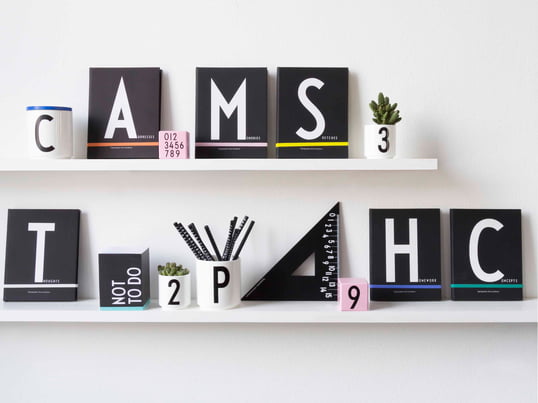 The most important office supplies get decorated with ornamental typography. Using the letters of Arne Jacobsen, which were meant for the townhall in Aarhaus, it gets easy to keep tidiness in office and home office.