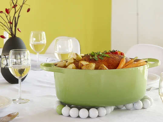 A coaster is as much a part of the table setting as plates, glasses and knives. Trivets protect tabletops and tablecloths from the heat of freshly cooked food in pots and bowls. But in fancy colors or materials, a trivet is also a decorative addition to the kitchen.