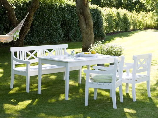 Garden furniture in the interior design shop