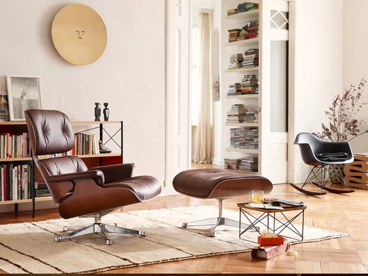 Lifestyle product image: The Lounge Chair by Vitra out of leather was coined by Charles and Ray Eames. The two designers designed the comfortable leather chair for a friend.
