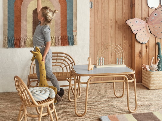 Rainbow series from OYOY in the ambience view. With the chair, bench and table from the Rainbow series, the children get their very own seating area in the living room.