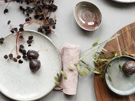 Lake earthenware plate Ø 21,4 cm, grey by House Doctor in the ambience view. The Lake crockery sets natural accents on the laid table.