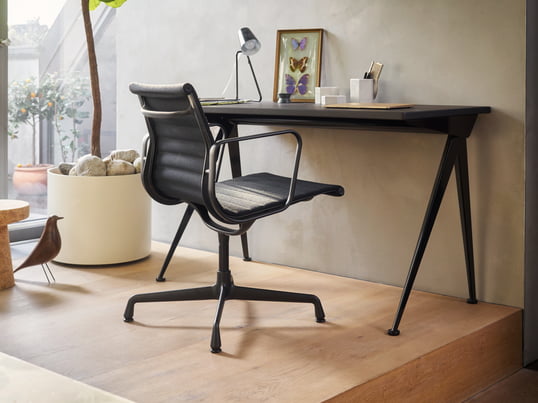 The Pyramid desk by Hay in the ambience view: The industrial desk made of wood and steel inspires with a timeless and rustic charm in the study.