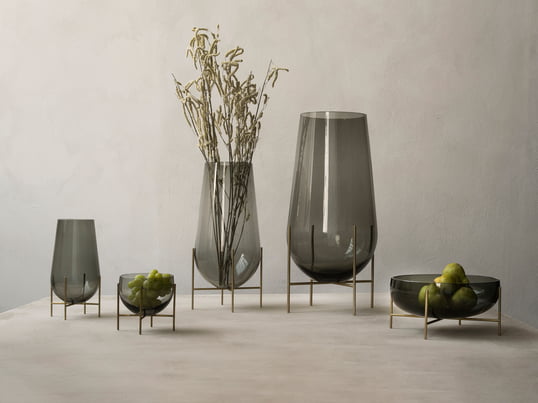 The Echasse vases series in the ambience view: Different sizes of vases and bowls for different applications on the table or floor.