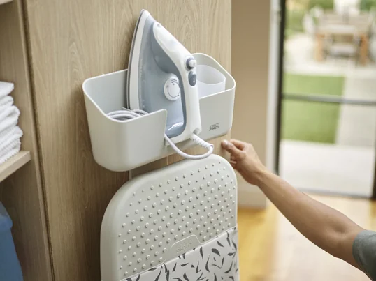 The Joseph Joseph IronHub is the ultimate solution for keeping your ironing area tidy. This innovative iron holder combines functionality with stylish design and offers a practical storage option for the iron and accessories.