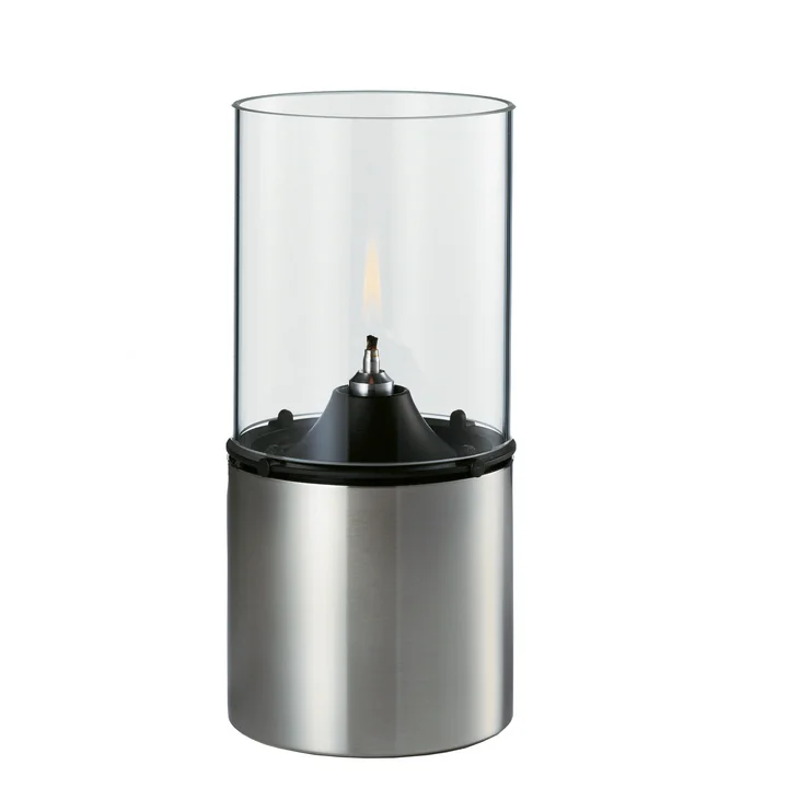 The oil lamp from Stelton made of glass and stainless steel