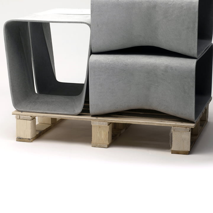 Eternit - Ecal Stool in grey, stacked on pallet