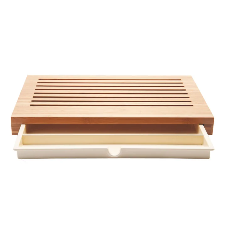 Sbriciola bread cutting board by Alessi with open drawer