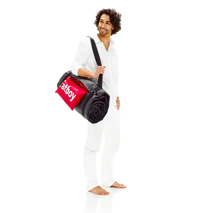 Fatboy - Picnic Lounge rolled up, with carrying strap