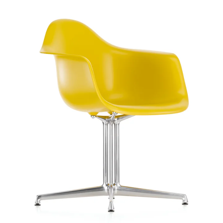 Eames Plastic Armchair DAL from Vitra in yellow with felt glides