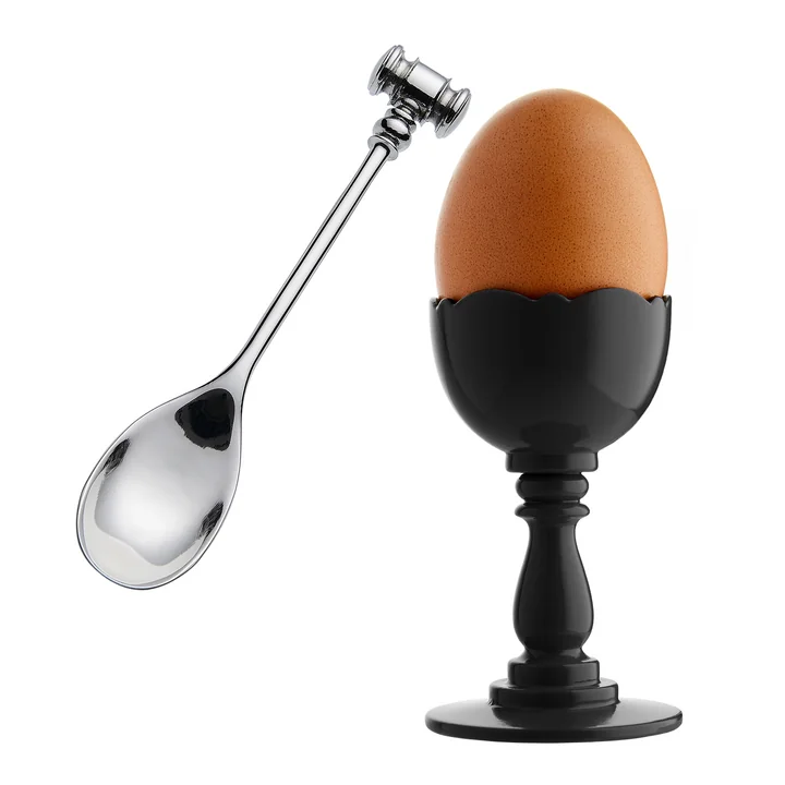 Dressed egg cup and egg spoon, black by Alessi