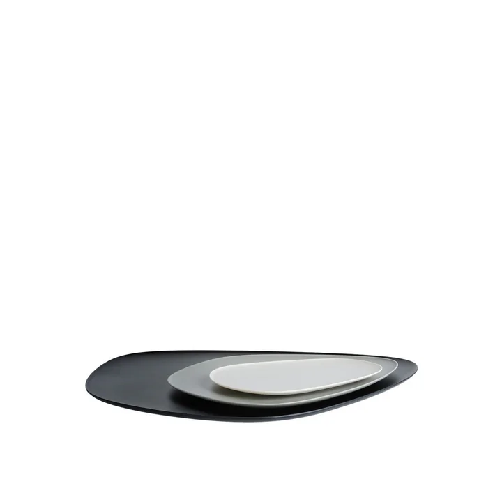 Namasté tray set by Kartell in black, grey and taupe
