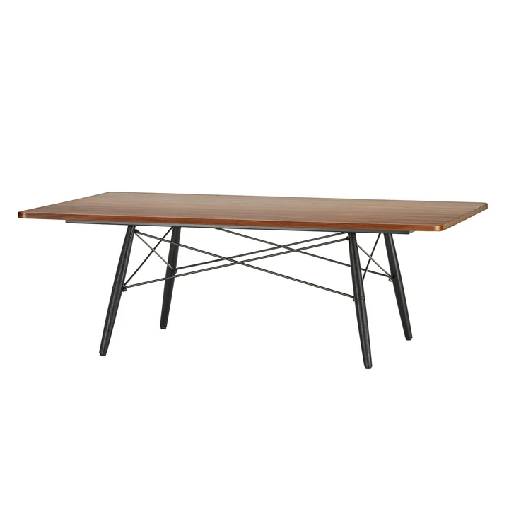 The Eames Coffee Table in palisander veneer with a pedestal made of black ash by Vitra.