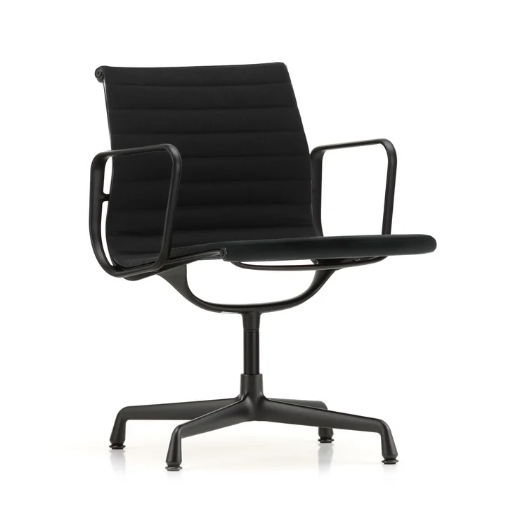 EA 104 swivel chair coated in deep black with armrests, rotatable from Vitra in Hopsack nero (felt glider)