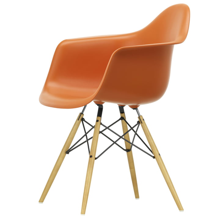 Eames Plastic Armchair DAW from Vitra in maple yellowish / rust orange