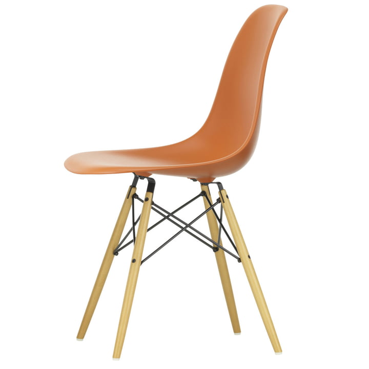 Eames Plastic Side Chair DSW by Vitra in maple yellowish / rust-orange