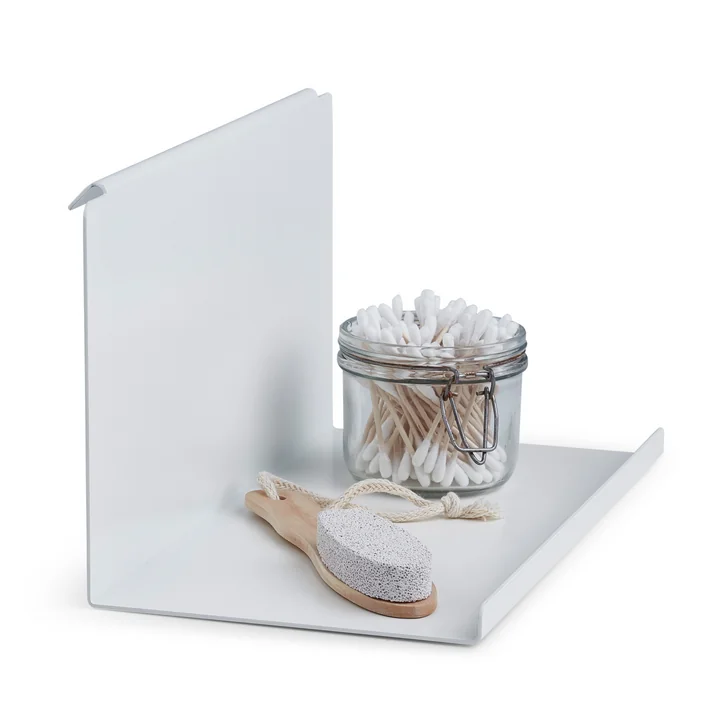 Flex Side Table in white by Gejst with bathroom utensils