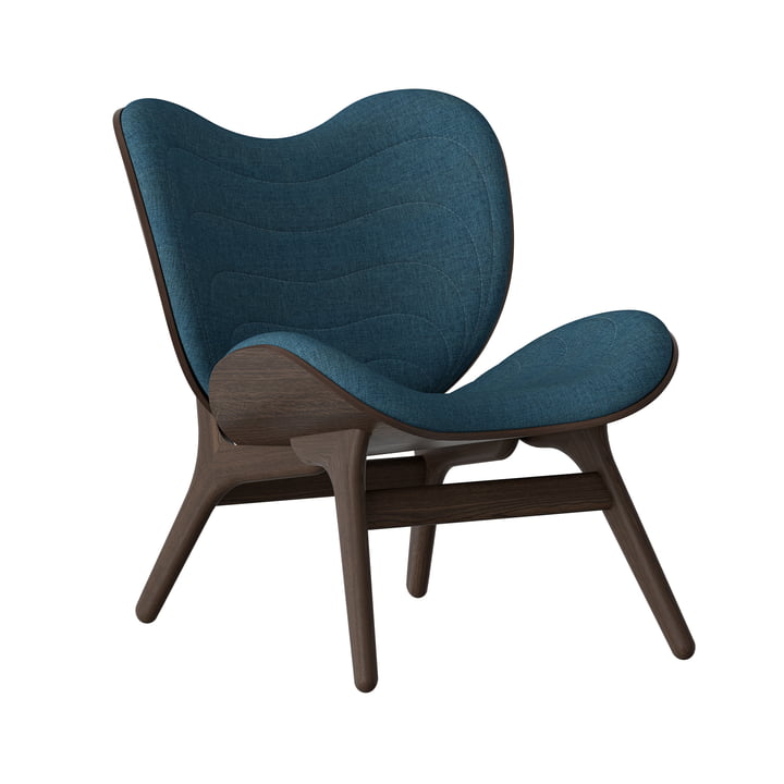 A Conversation Piece Armchair from Umage in dark oak / petrol blue