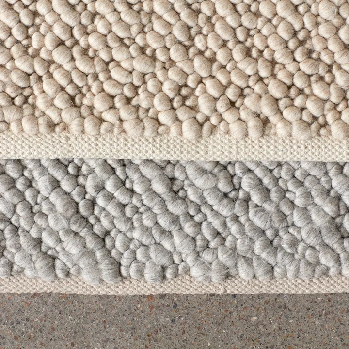 Gravel carpet in ivory and gray from Audo
