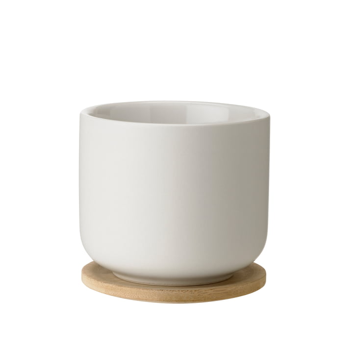 Theo Tea mug with coaster from Stelton in sand