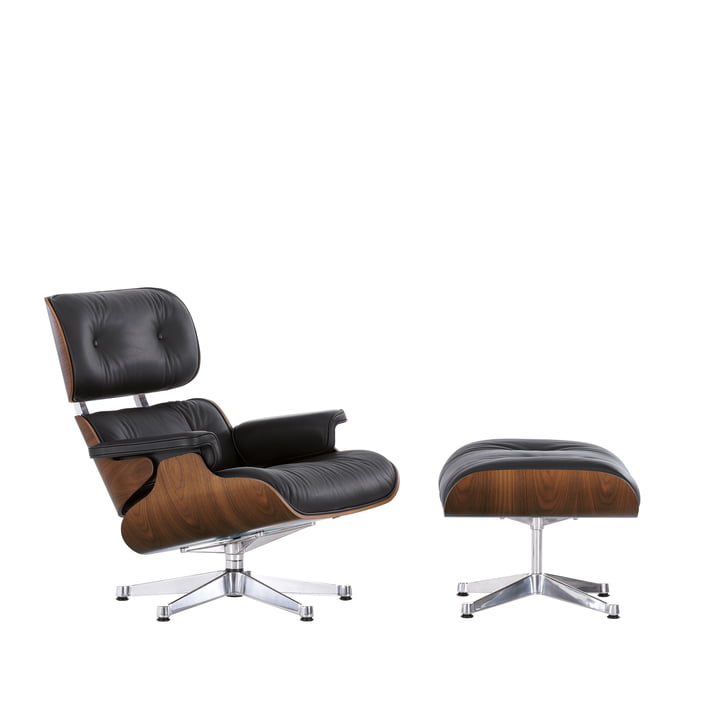 The Lounge Chair & Ottoman by Vitra with a polished finish, black pigmented walnut, premium leather nero (classic)