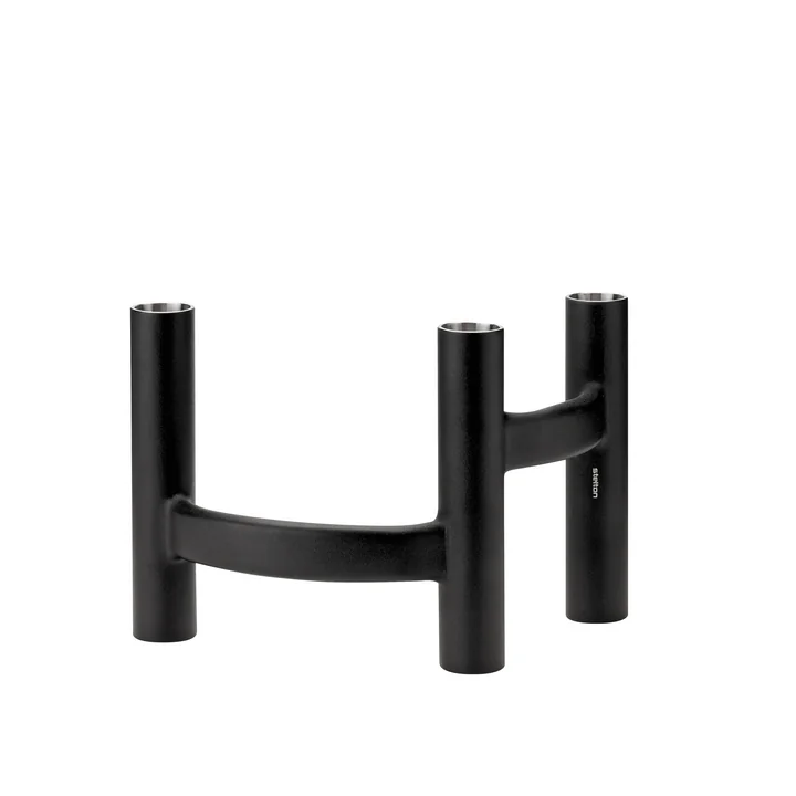 The candlestick three-armed, black from Stelton