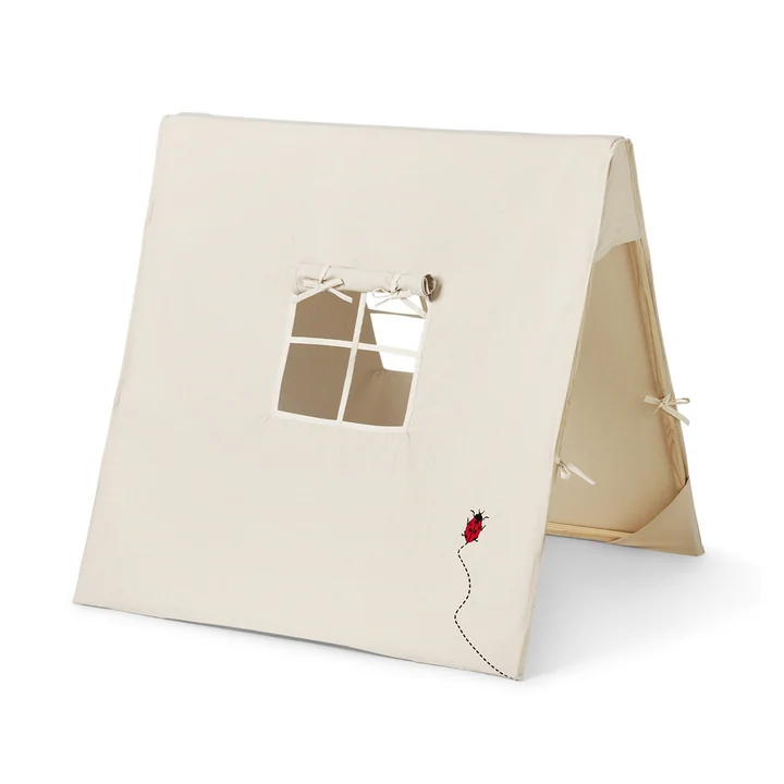 The play tent Ladybird from Ferm Living in nature