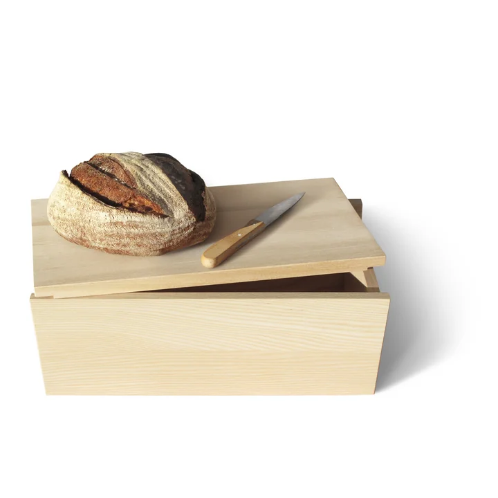 The functional bread box Moin! from side by side with a bread on the lid