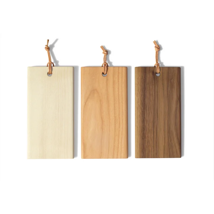 The Tiny cutting board from side by side in its different types of wood