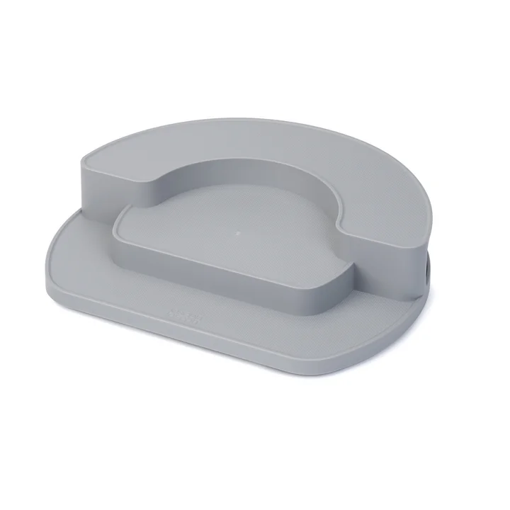 The CupboardStore swivel step organizer with storage compartments from Joseph Joseph in dark grey