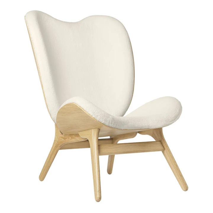The A Conversation Piece Tall armchair from Umage , oak / teddy white