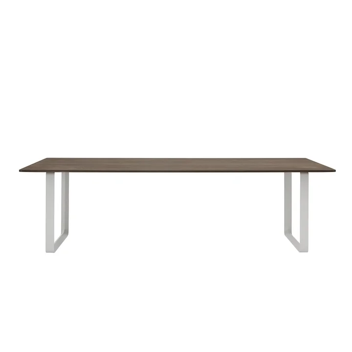 70/70 dining table measuring 255 x 108 cm from Muuto in smoked oak / grey