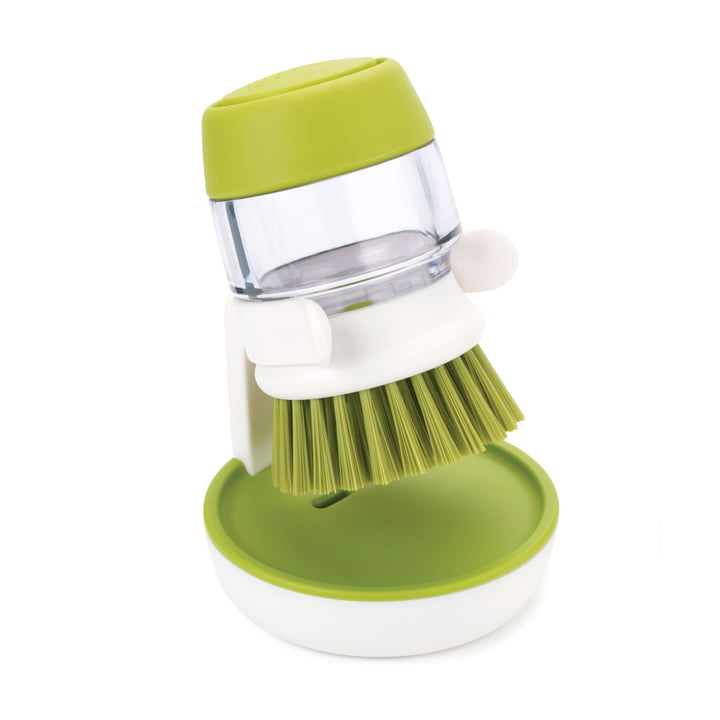 Palm Scrub Dishwashing brush with detergent dispenser from Joseph Joseph in green