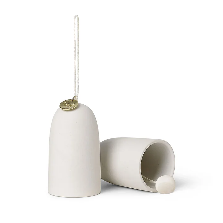 Ceramic pendant bells by Ferm Living in the color off-white