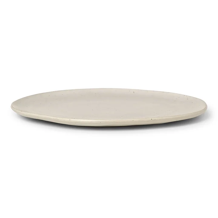 Flow Dinner plate by Ferm Living in the color off-white