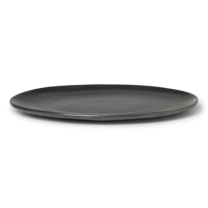 Flow Dinner plate by Ferm Living in the color black