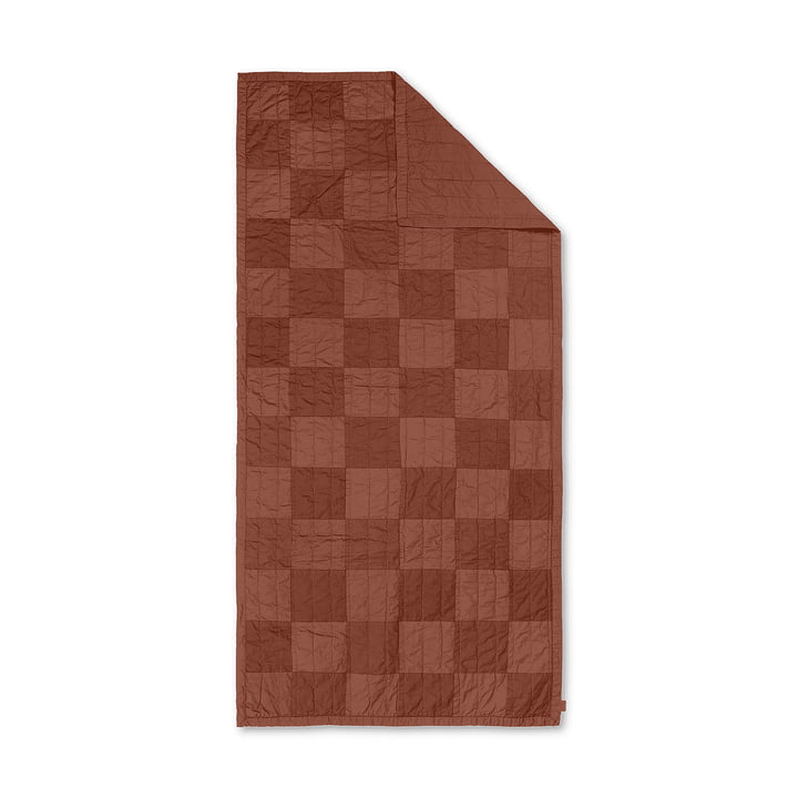 Duo Quilt by ferm Living in the color reddish brown