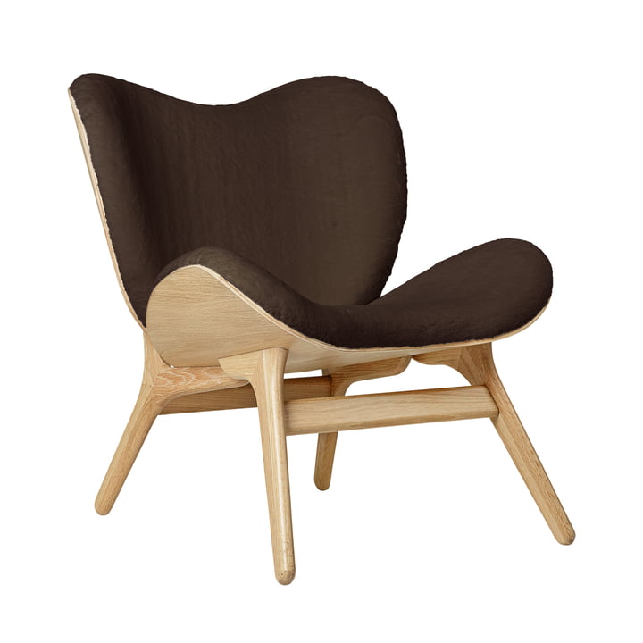 A Conversation Piece Armchair from Umage in natural oak / teddy brown