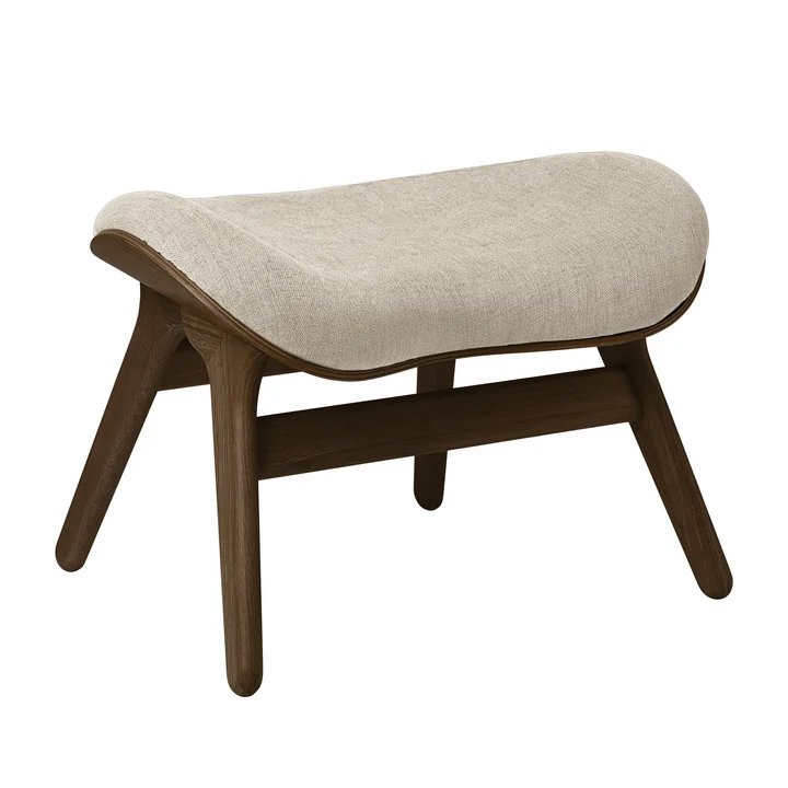 A Conversation Piece Ottoman from Umage in the dark oak version / white sands