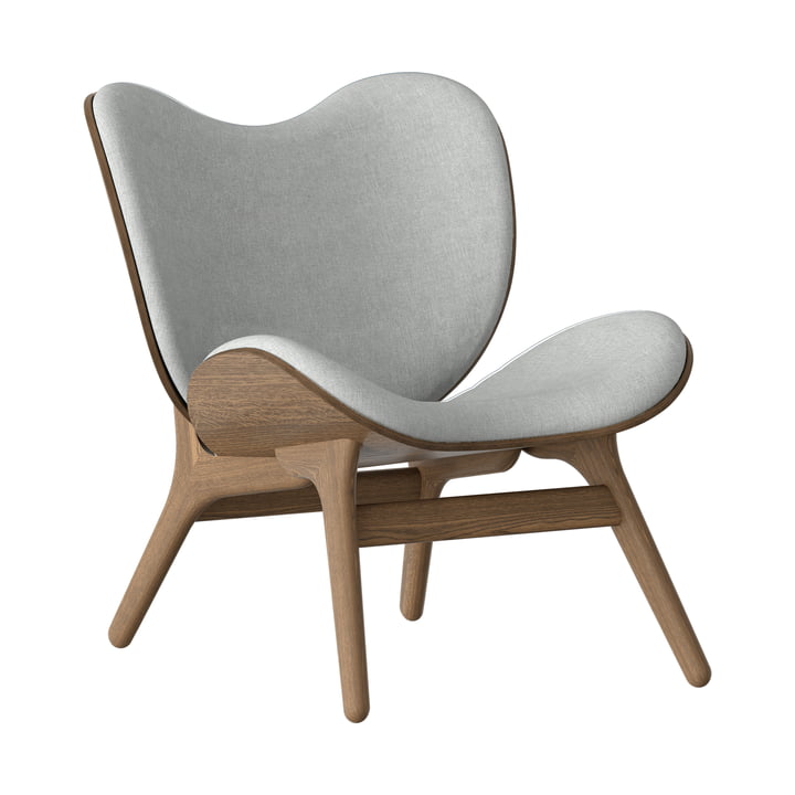 A Conversation Piece Armchair from Umage in the finish dark oak / sterling