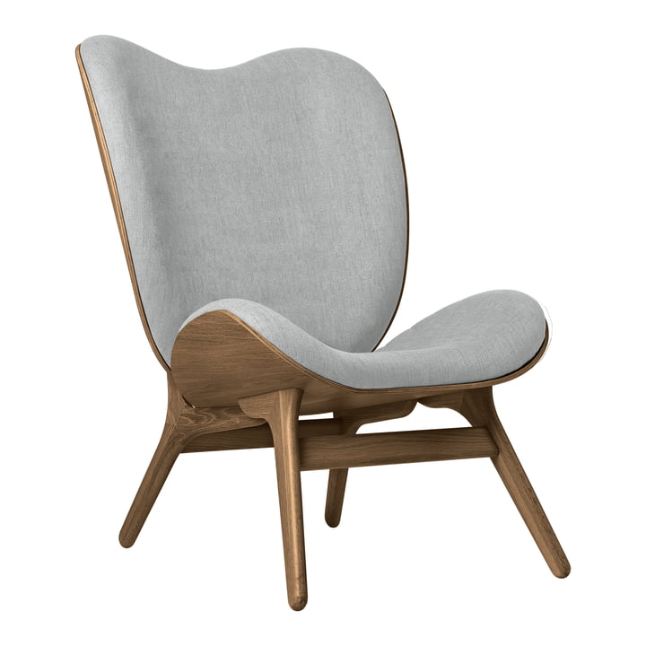 A Conversation Piece Tall Armchair from Umage in the finish dark oak / sterling