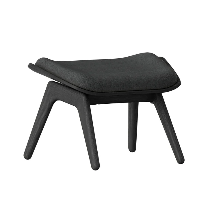 The Reader Ottoman from Umage in the black oak version / shadow
