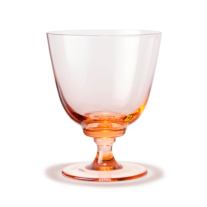 Flow Drinking glass with foot with Holmegaard in the color pink